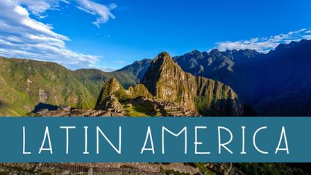 machu picchu ruins with mountain and clear sky in the background with text latin america 